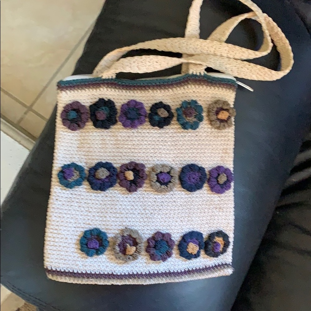 Small bag with flower embellishments